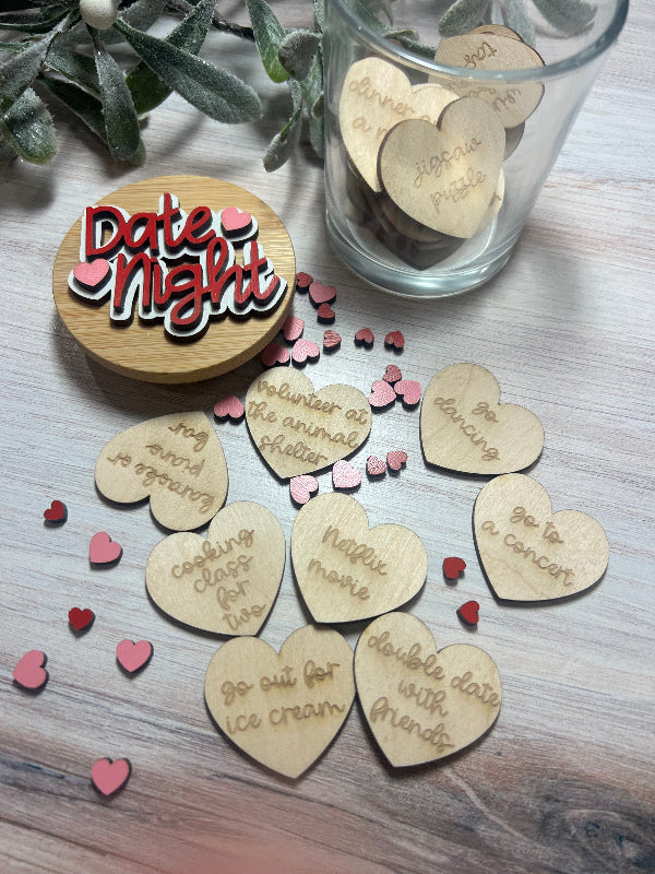 Wooden heart-shaped tokens with date ideas in a glass jar.