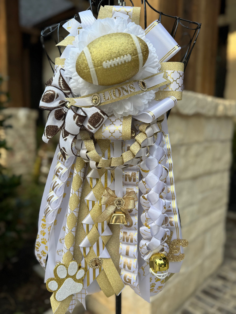 Senior Homecoming Garter, gold and white ribbon.  Lake Creek High School.  Lions Banner
