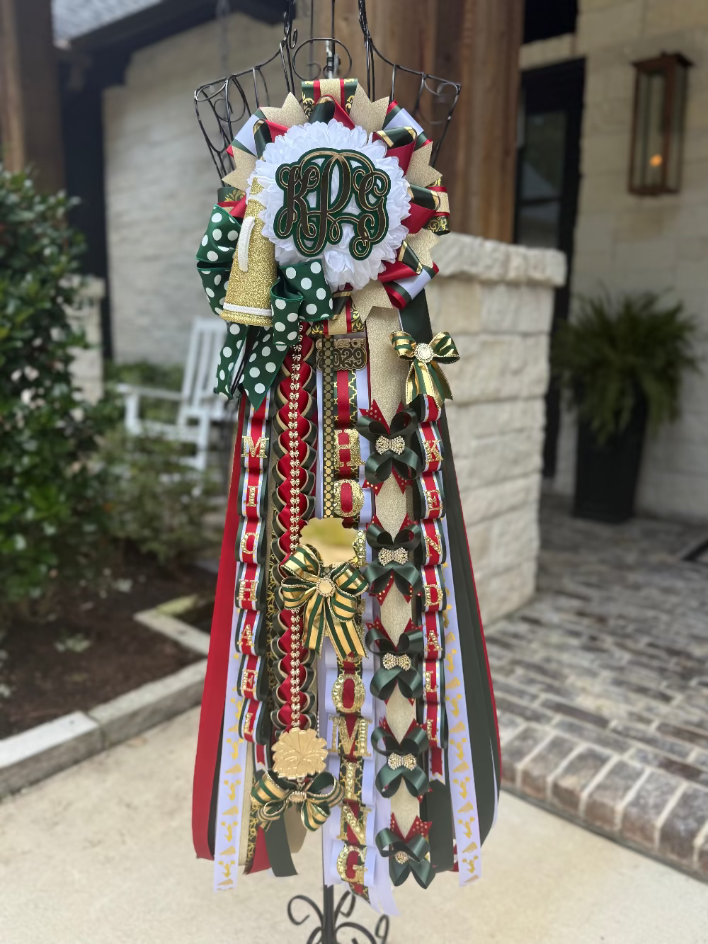 Single mum in red, hunter green, white and gold.  The Woodlands High School