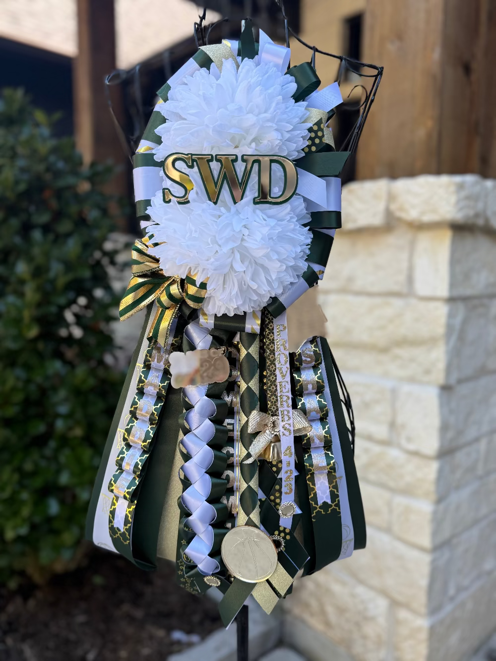 Double Garter, The Woodlands Christian Academy. Hunter green, gold and white ribbon.