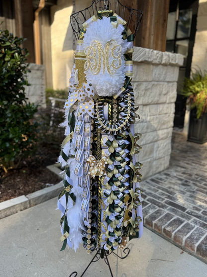 Double Homecoming Mum with custom monogram and braids.  Hunter green, white and gold.  The Woodlands Christian Academy.