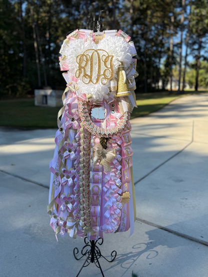 Triple Homecoming Mum in soft pink, white and gold with custom monogram and braids