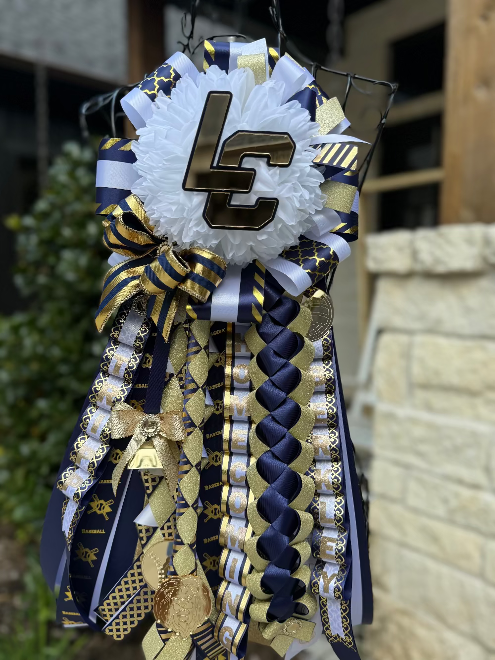 Single Homecoming Garter, Lake Creek High School. Navy, gold and white ribbon.